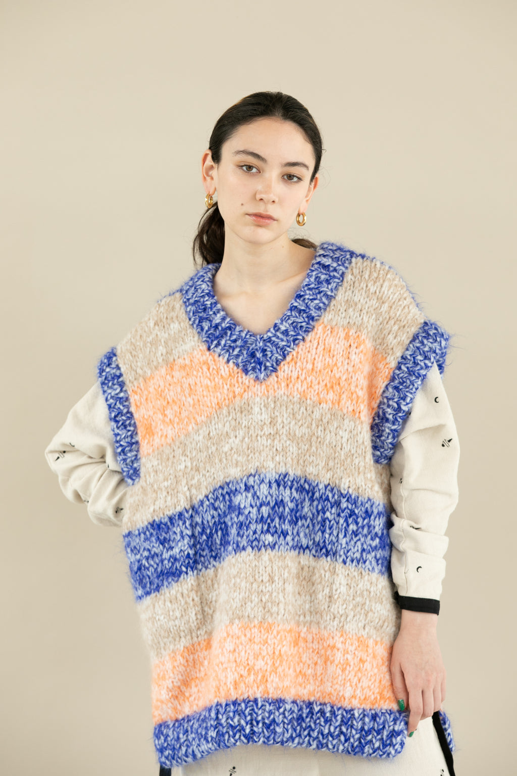 Handmade border knit vest